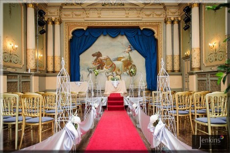 Craig y Nos Castle Wedding Ceremony Room red aisle carpet, white drapes down sides of aisle