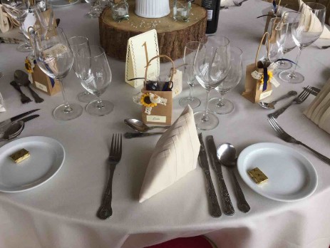 Table setting with log centrepieces South Wales Wedding Venue Craig y Nos Castle