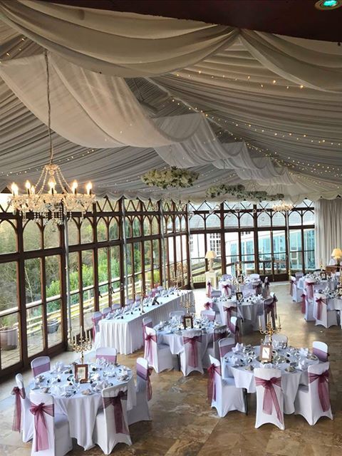 Craig y Nos Castle Wedding Venue Swansea Conservatory with tables set up ready for wedding