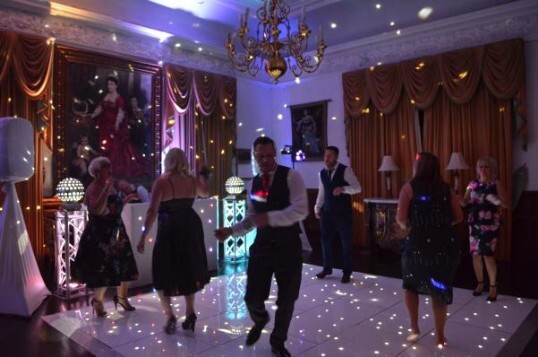 Pure Weddings DJ Evening Entertainment Package guests party on dance floor
