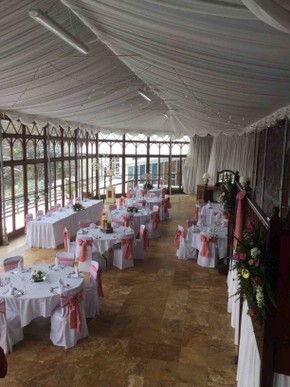 Open day Craig y Nos Castle Conservatory pink ribbons white chair covers