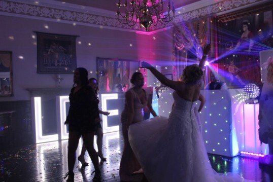 Pure Weddings DJ  guests party on dance floor