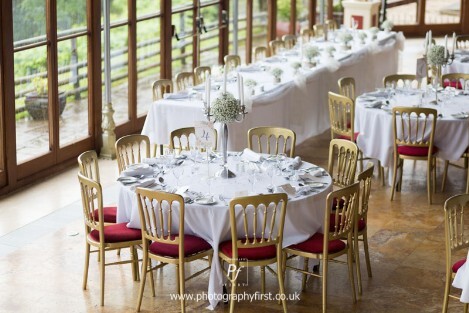 Craig y Nos Castle Wedding Venue in Swansea showing Conservatory Wedding Breakfast with white linen