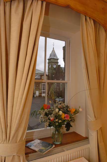 Wedding Venues South Wales - Craig y Nos Castle Accommodation Room AB27 bedroom with view of the clock