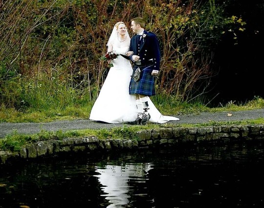 Wedding Planner Guide, Wedding Couple by Lake in Craig y Nos Country Park 