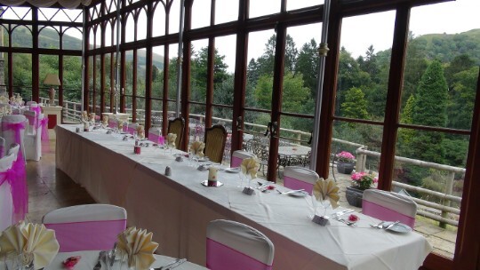 Craig y Nos Castle Wedding Venue Swansea Conservatory Wedding Breakfast head table with pink colours