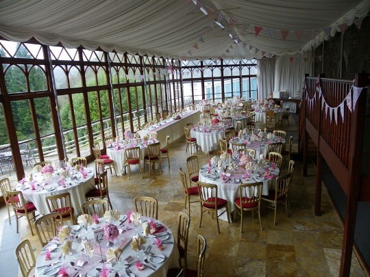Craig y Nos Castle Wedding Venue Swansea Conservatory Wedding Breakfast pink flowers theme and bunting
