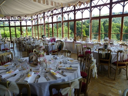 Craig y Nos Castle Wedding Venue Conservatory with tables set up for a Wedding Breakfast