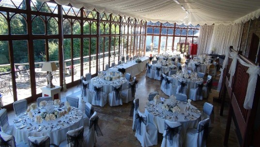 Craig y Nos Castle Wedding Venue in South Wales with the Conservatory set up for wedding breakfast