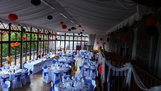 Craig y Nos Castle Wedding Venue with Bunting in the Conservatory ready for a Wedding Breakfast