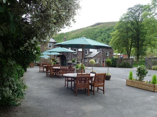 Craig y Nos Castle Wedding Venue Front Courtyard garden tables and chairs 