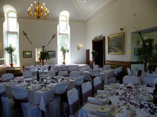 Craig y Nos Castle Wedding Venue in South Wales showing function room laid up for a wedding breakfast