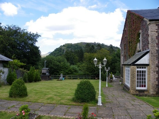 Craig y Nos Castle Wedding Venue Swansea Theatre Gardens sloping lawn down to lower gardens