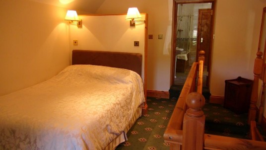 Master Bedroom in Gatehouse at Craig y Nos Castle Wedding Venue in Wales