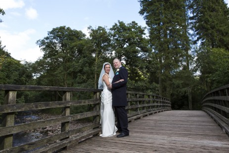 Wedding Photography by Nigel Pullen Photography, Couple on bridge in Craig y Nos Coutry Park