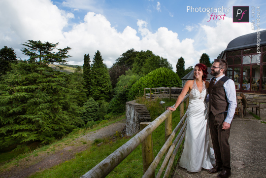 Couple outside the Conservatory at Craig y Nos Castle by Photography First