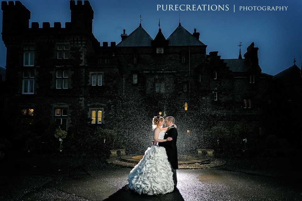 Bride and Groom in front of South Wales Wedding Venue Craig y Nos Castle