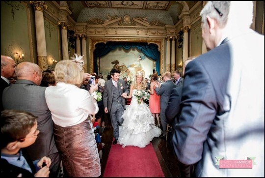 Wedding Couple in the Ceremony Room at Craig y Nos Castle Rachel Lambert Photography
