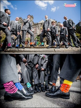 Guests show off coloured socks at Craig y Nos Castle Wedding Venue
