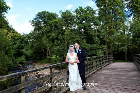 Wedding Couple on Bridge in Craig y Nos Country Park by Nigel Pullen Wedding Photography