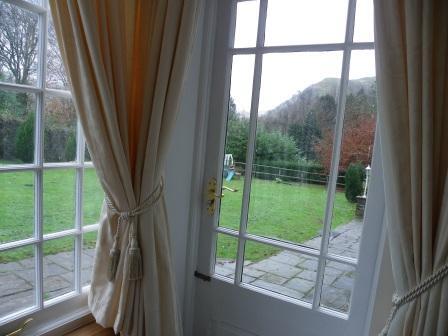 Wedding Venues South Wales - Craig y Nos Castle - looking outside window from theatre ground floor room